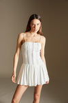 White dress with pleated skirt
